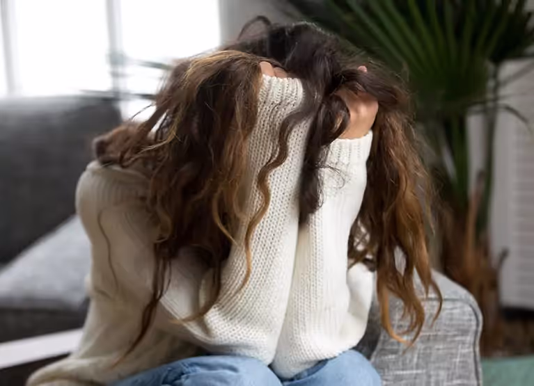 Woman pulling on hair