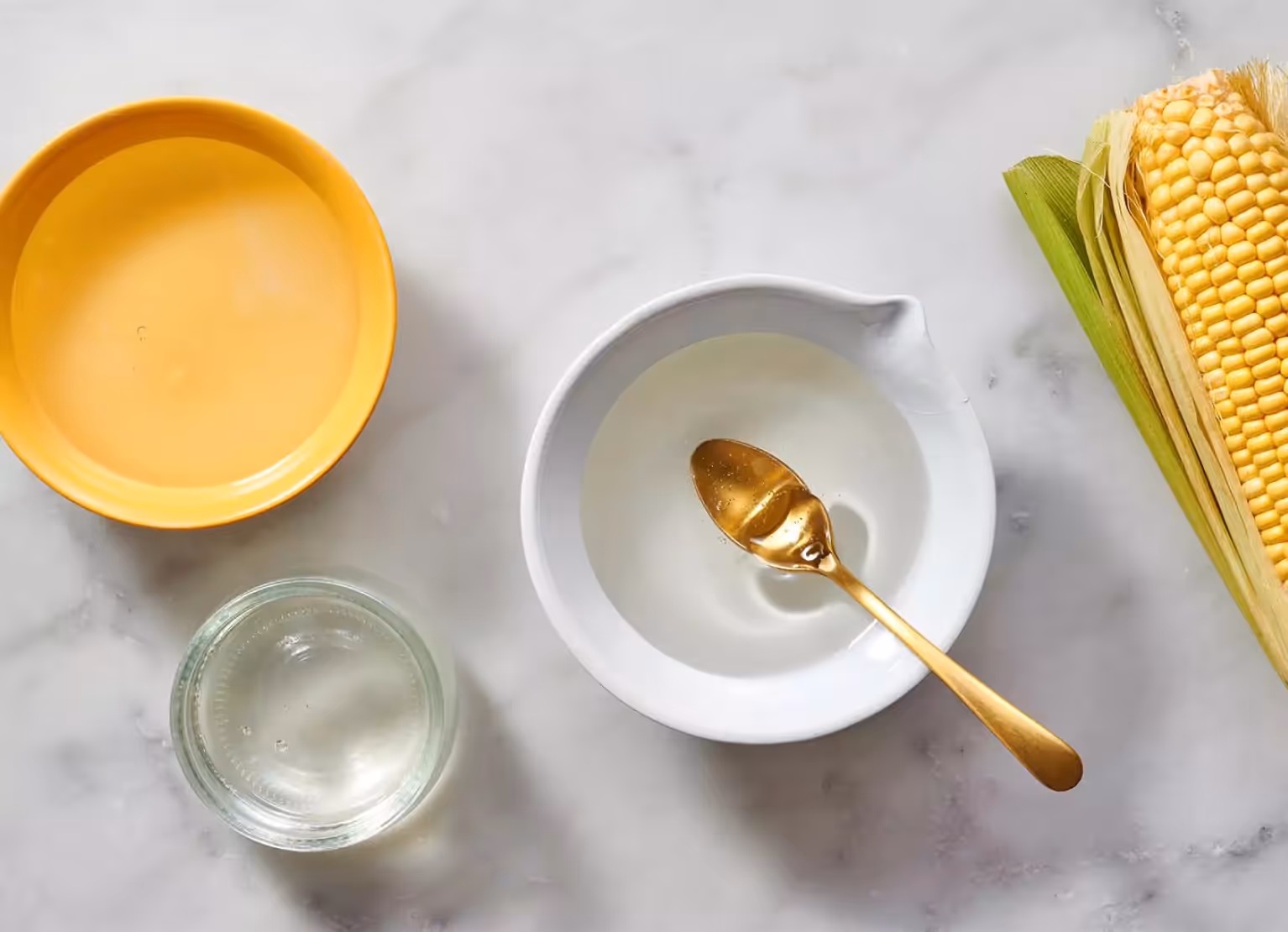 a bowl of high fructose corn syrup on a table