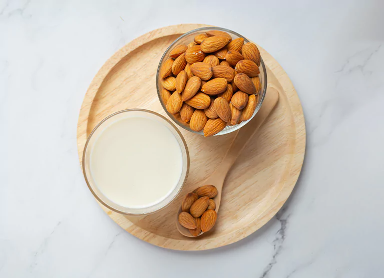 board of almonds and almond milk