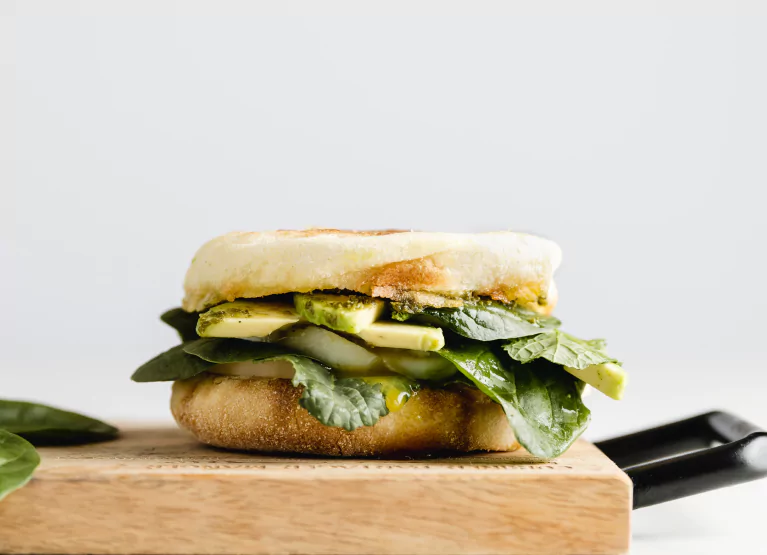 a sandwich on a cutting board