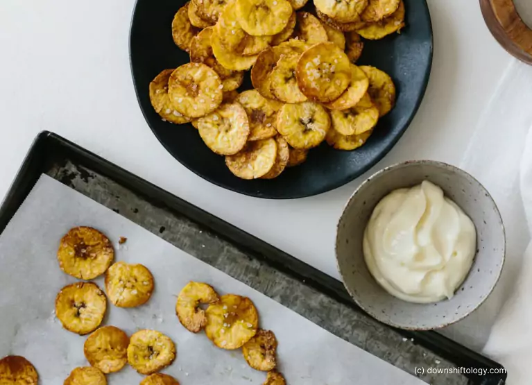 a plate and tray of plantain chips