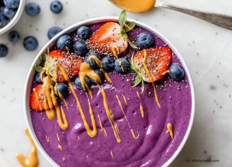 Protein packed smoothie bowl with strawberries and blueberries