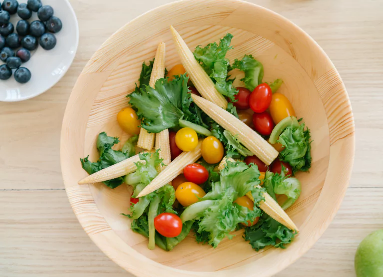 a bowl of veggies for a salad