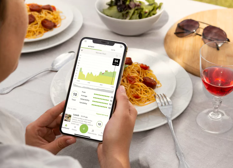 someone logging their pasta dinner into the nutrisense app