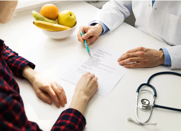 a doctor going over a patient report