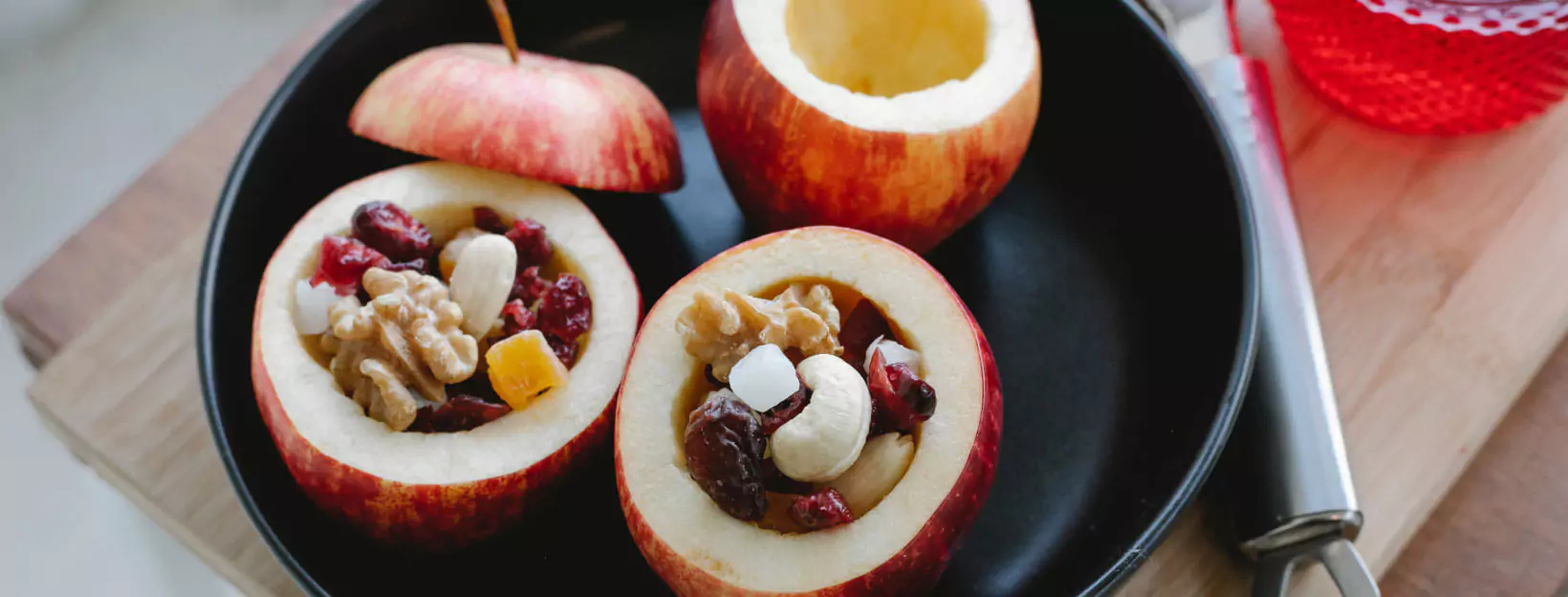 apples with nuts being prepared to be baked