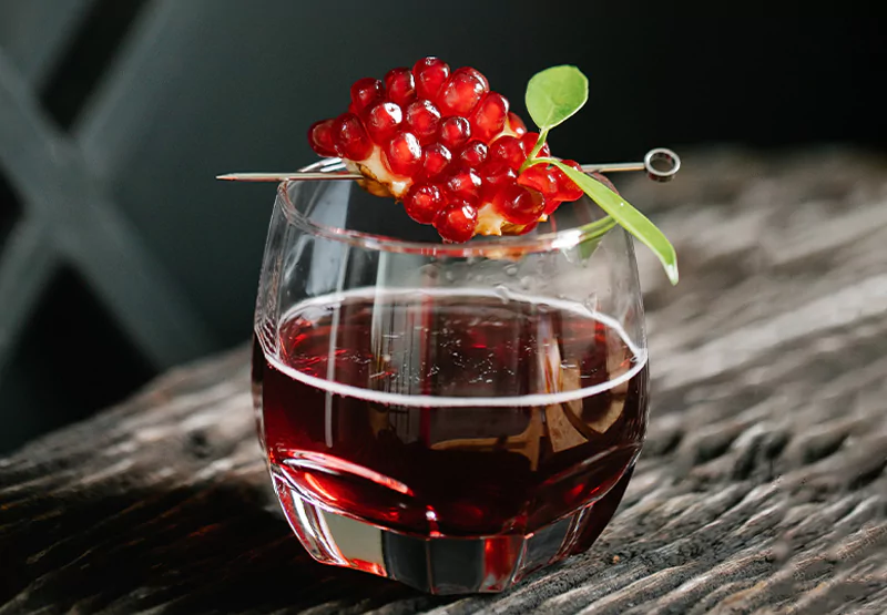 a glass of pomegranate juice