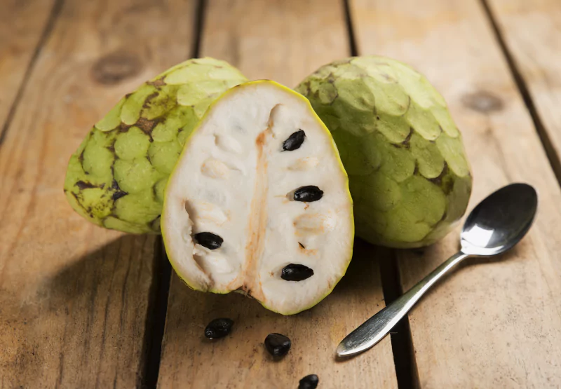 a custard apple cut into a few pieces