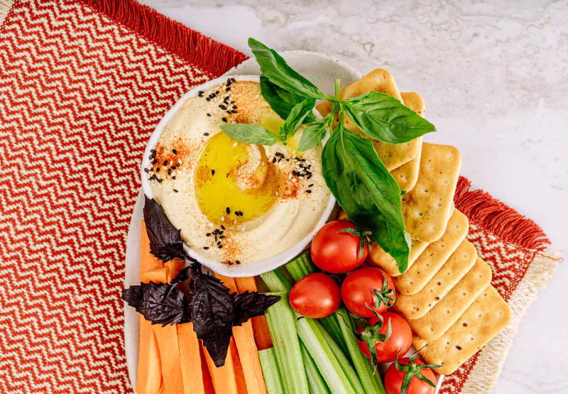 a hummus snack plate with veggies