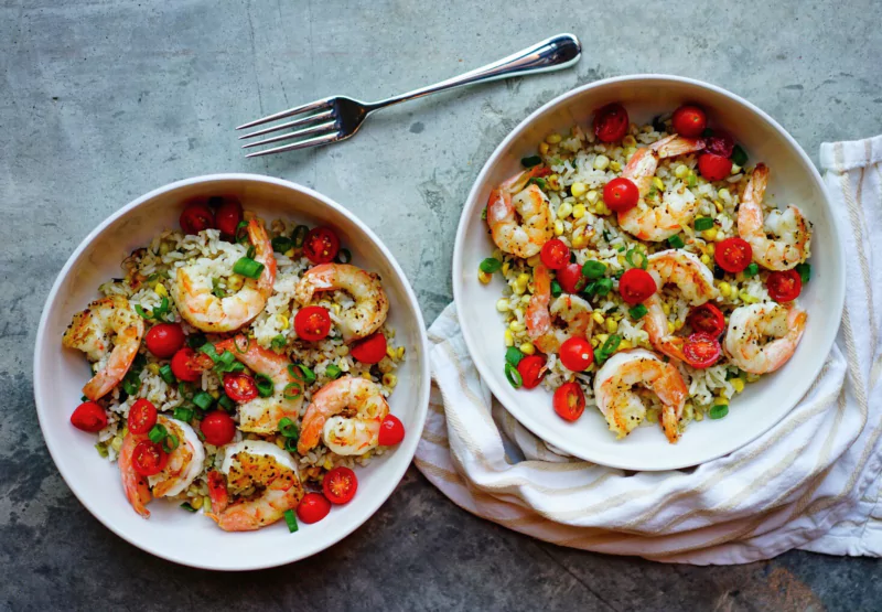 two bowls with shrimp and veggies