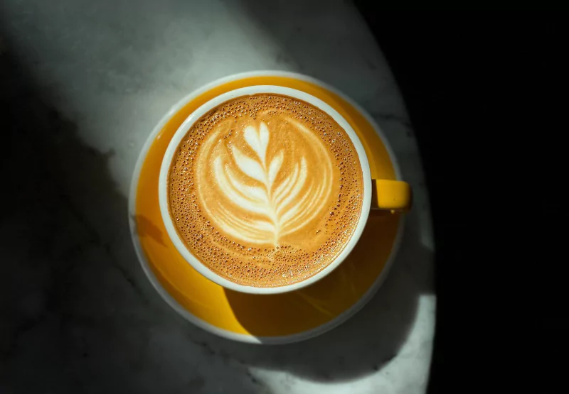 a cup of coffee with latte art