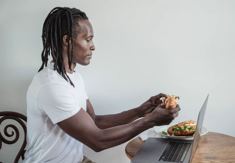 a man eating a sandwich