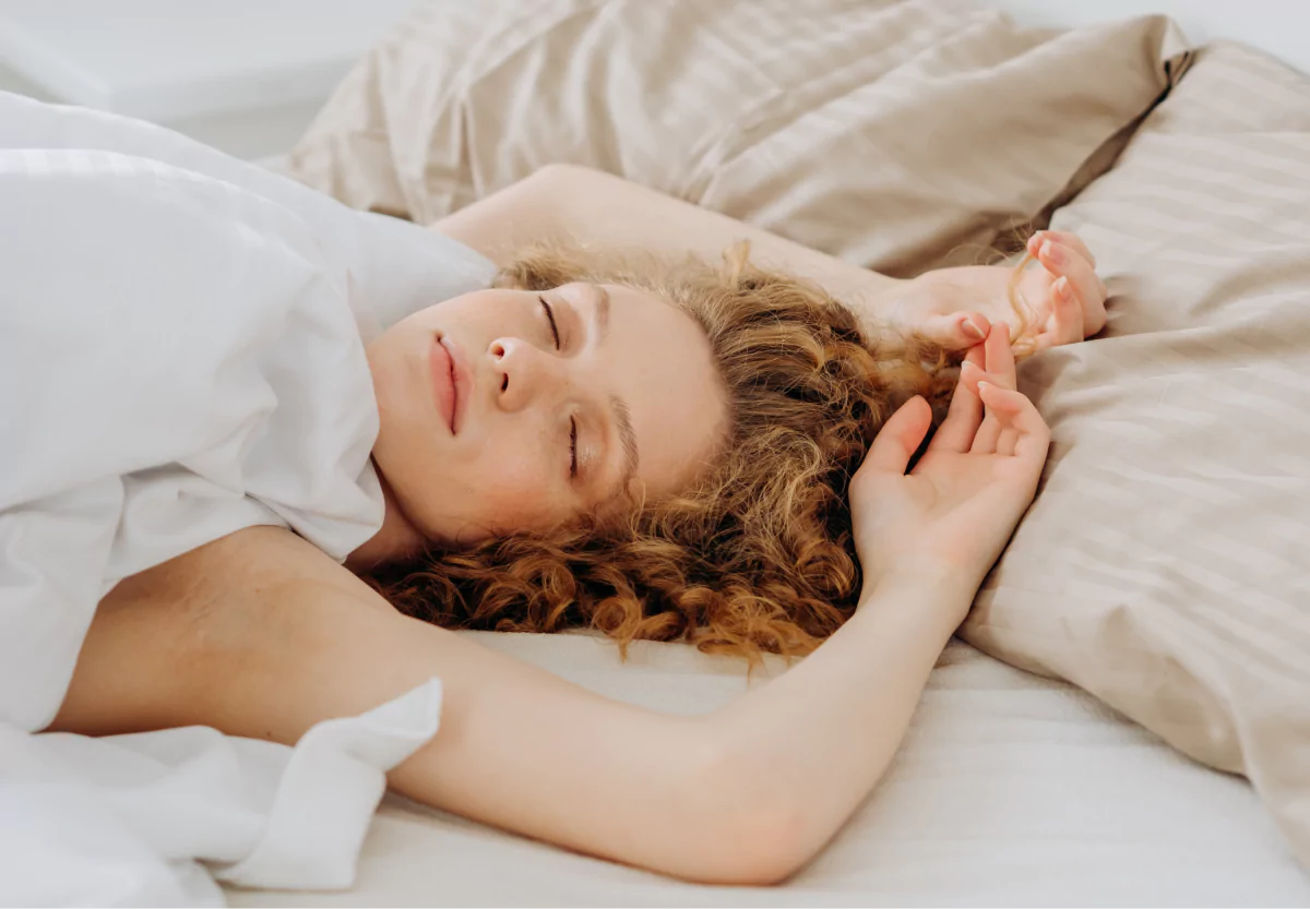 a woman relaxing in bed