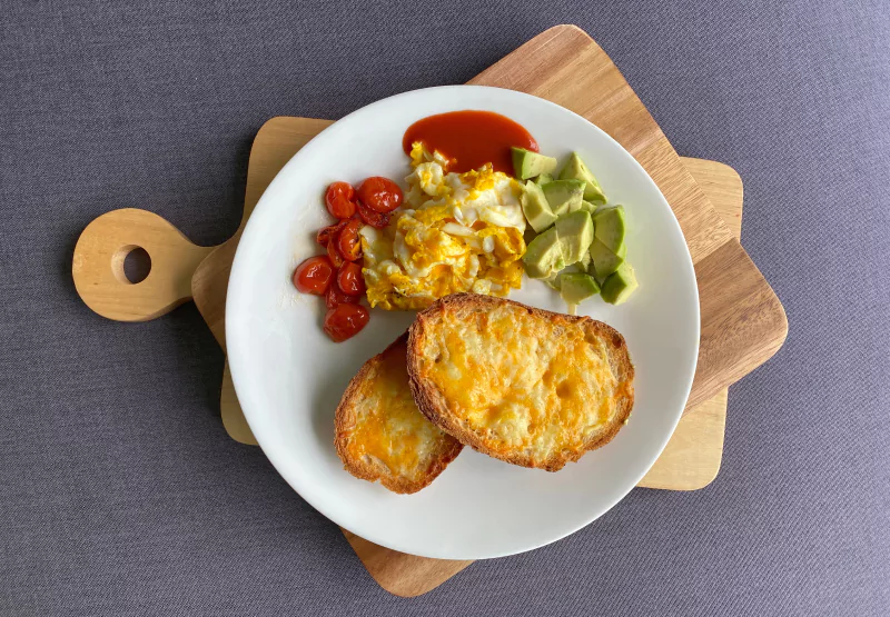 a plate of eggs and toast