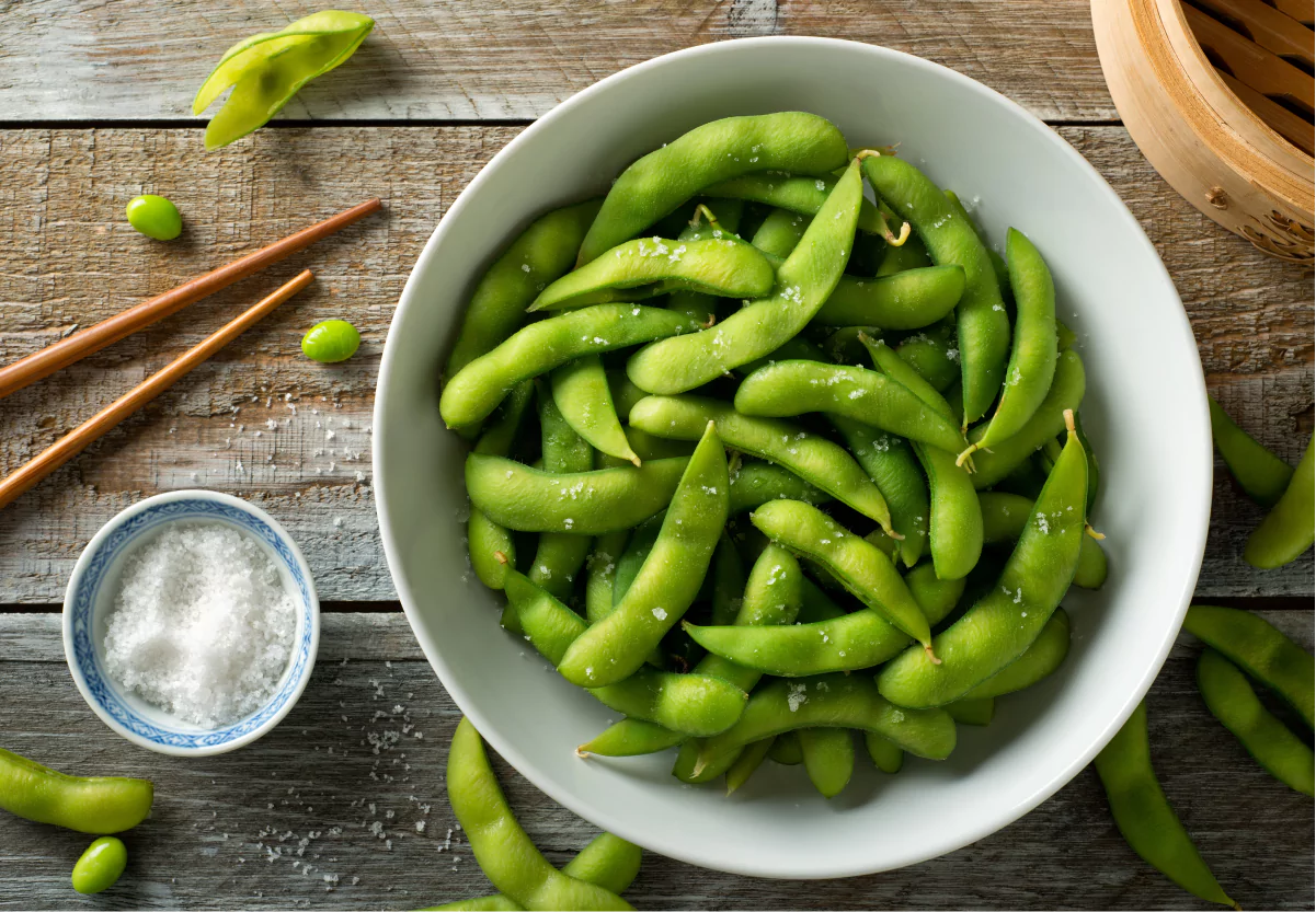 a bowl of steamed edamame