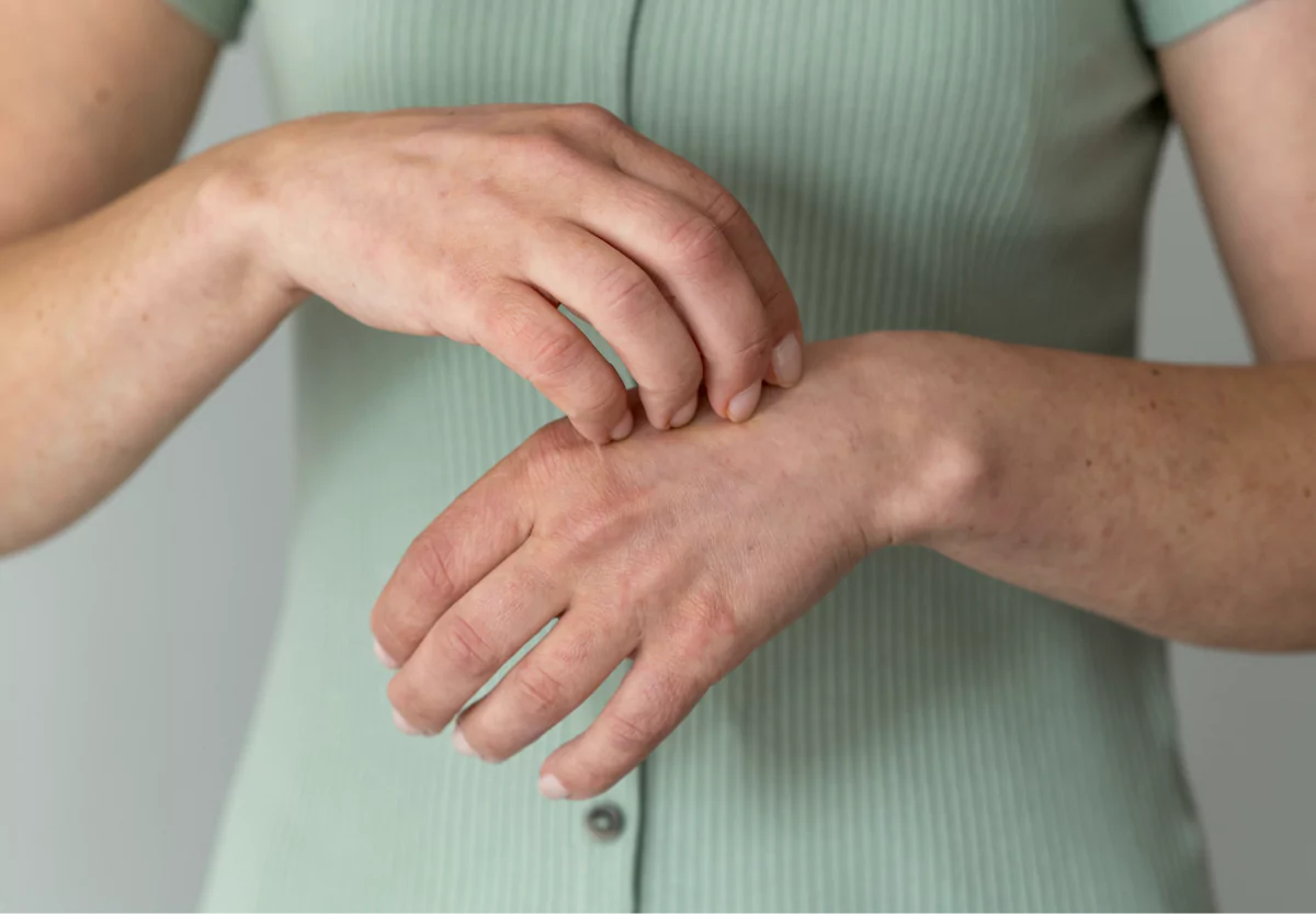 a person scratching their hand