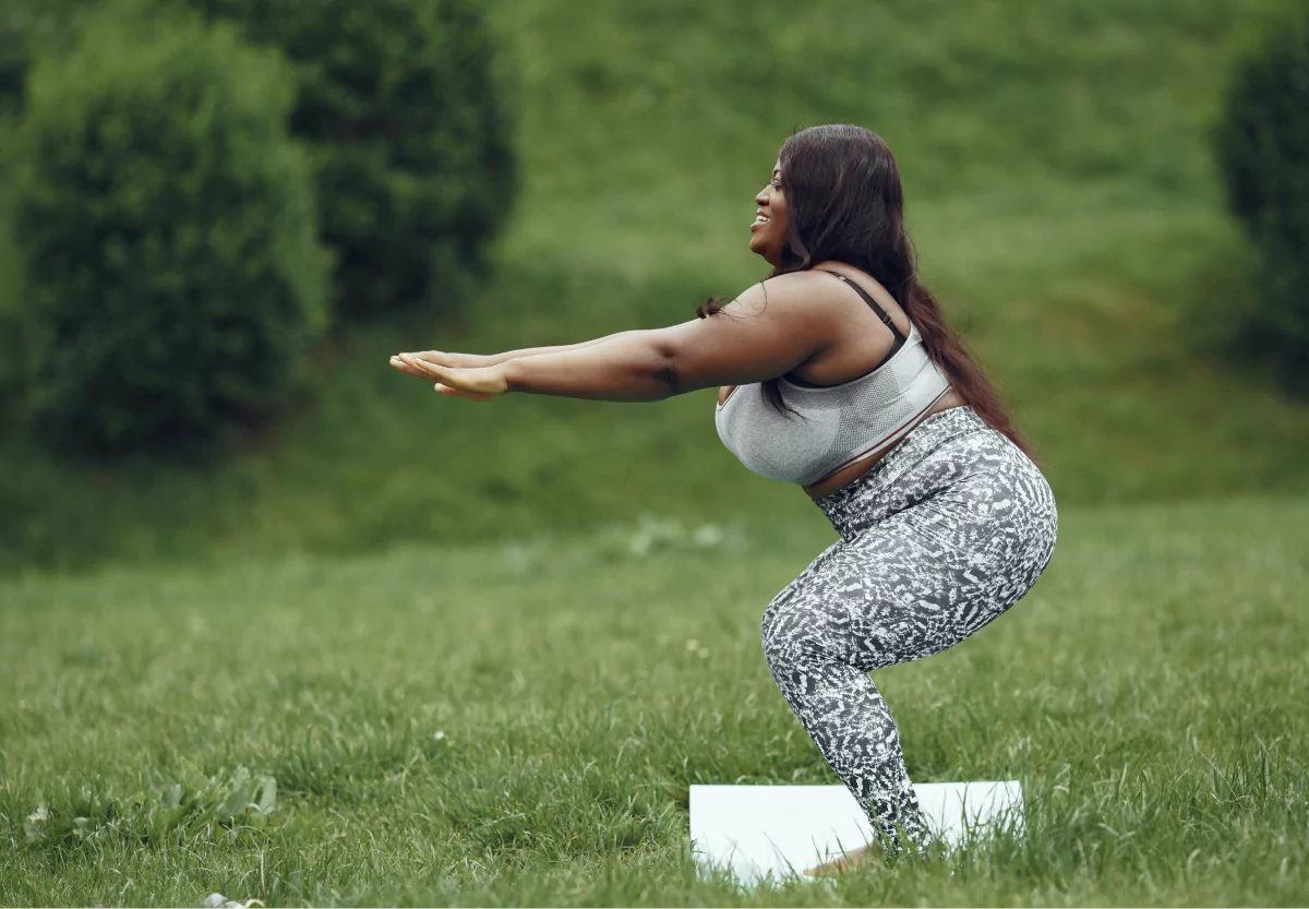 a woman doing a squat