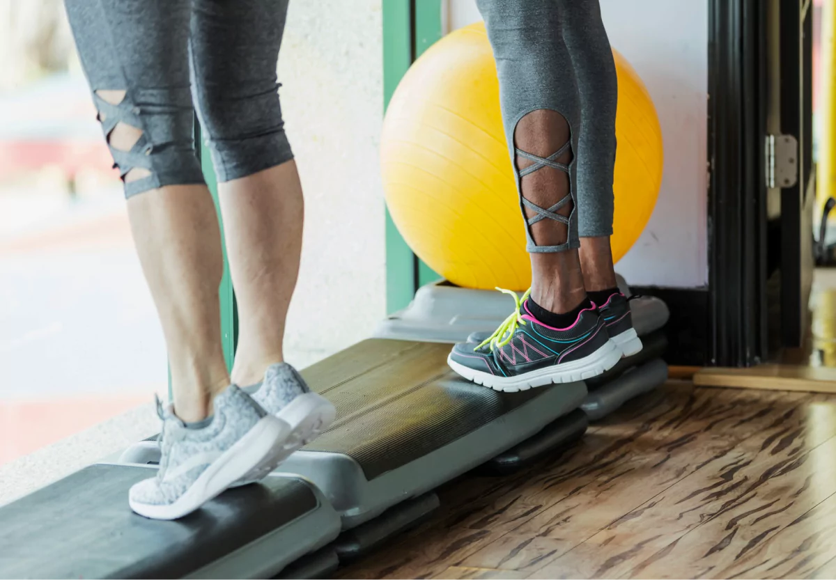 two people doing calf raises