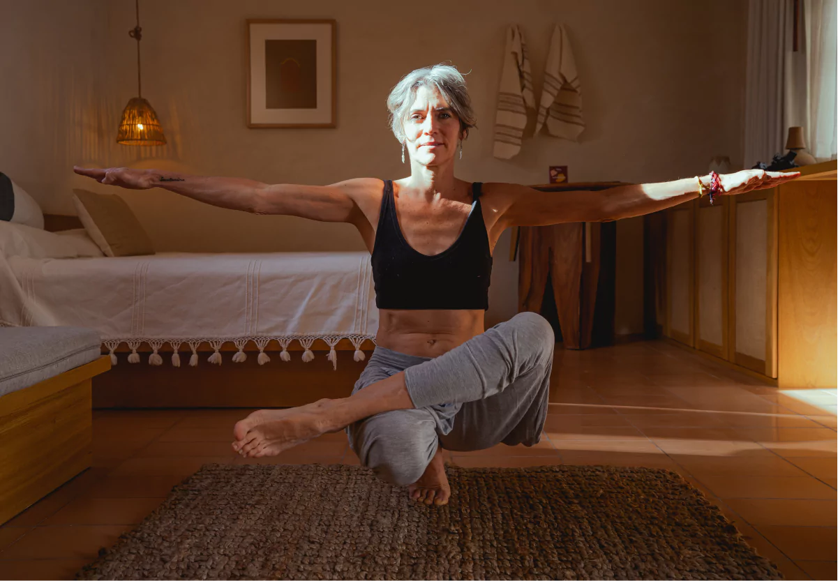 a woman doing a yoga pose