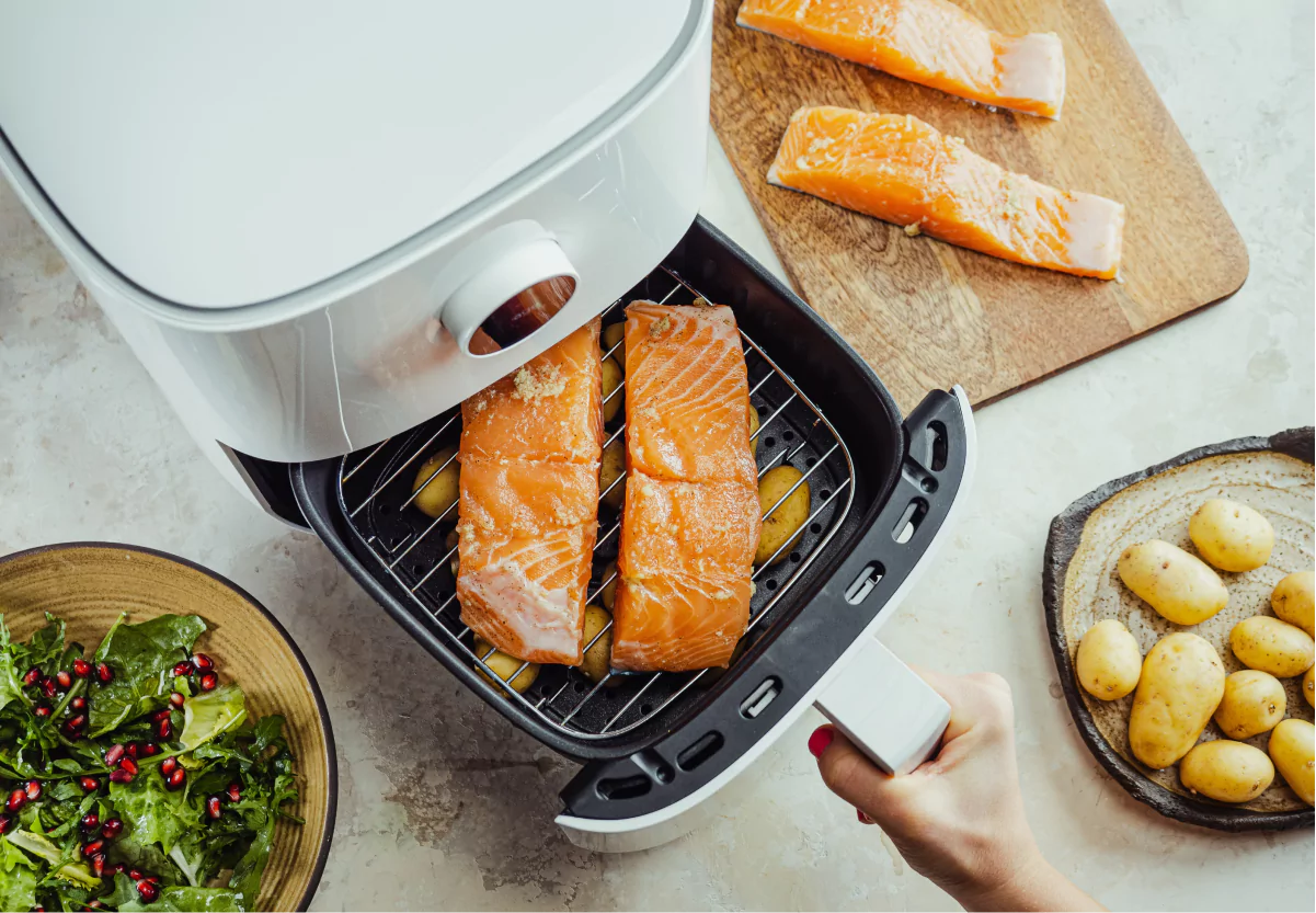 slices of salmon being cooked in an airfryer