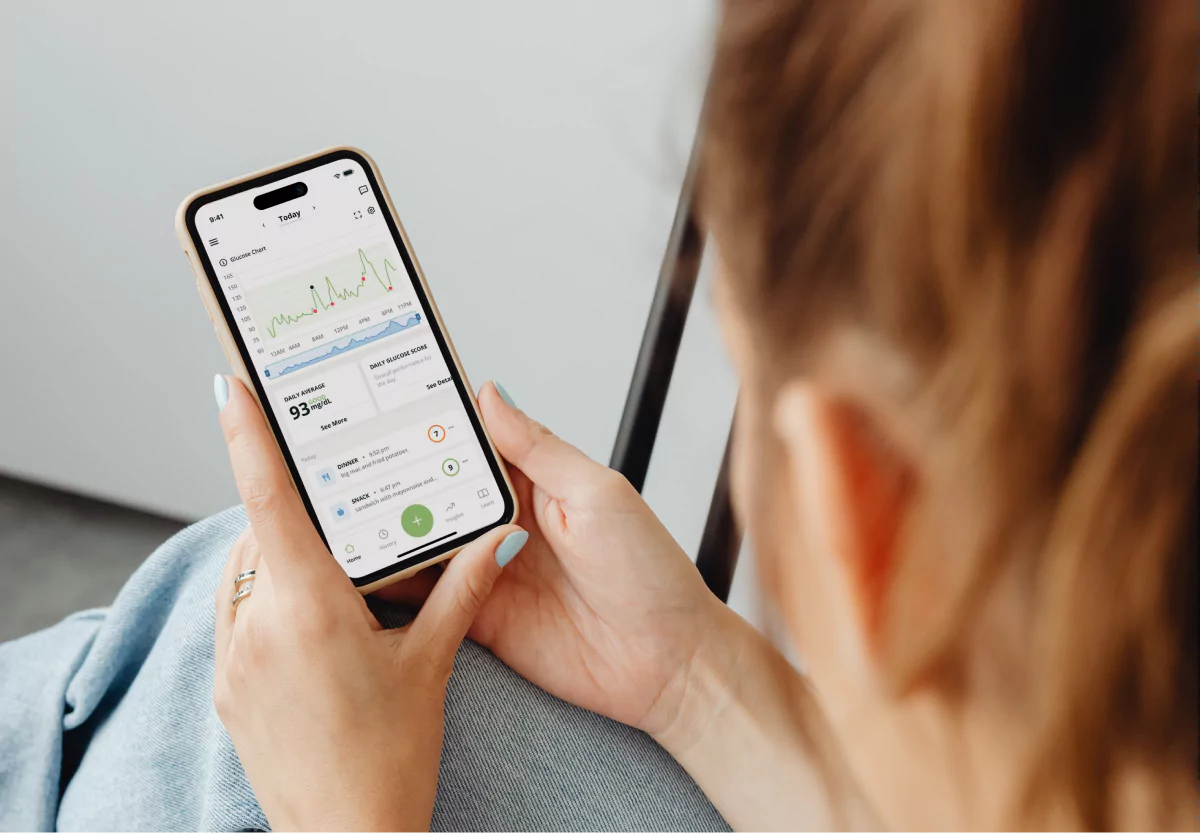 someone looking at their blood sugar in the nutrisense app