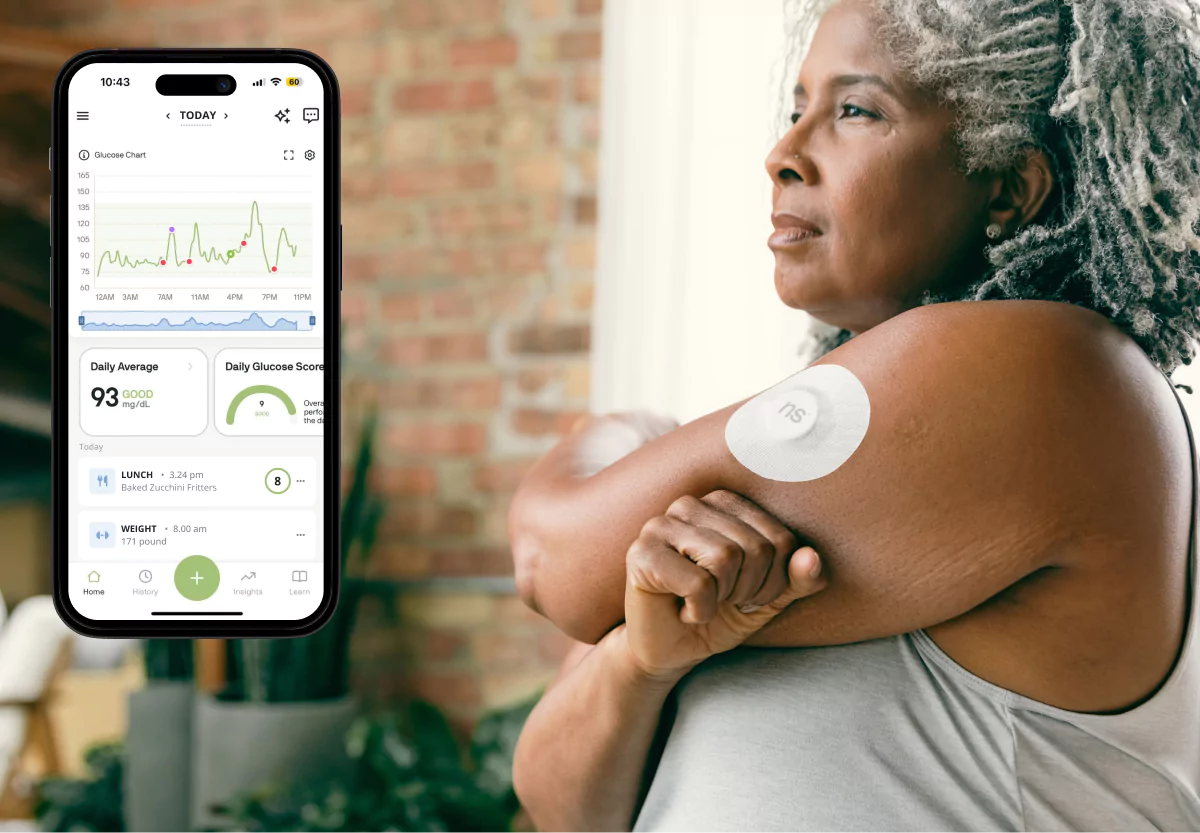 a woman with a nutrisense cgm and the nutrisense app