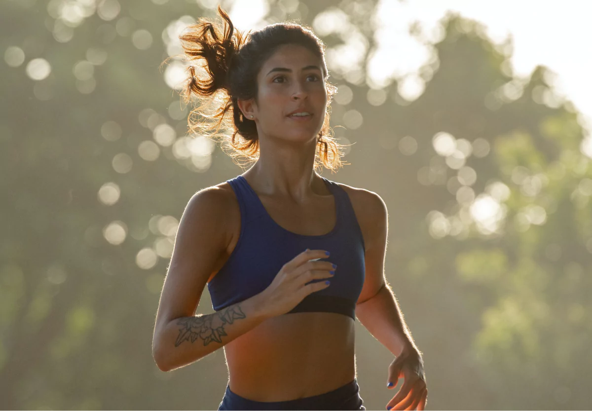 a woman running in the park