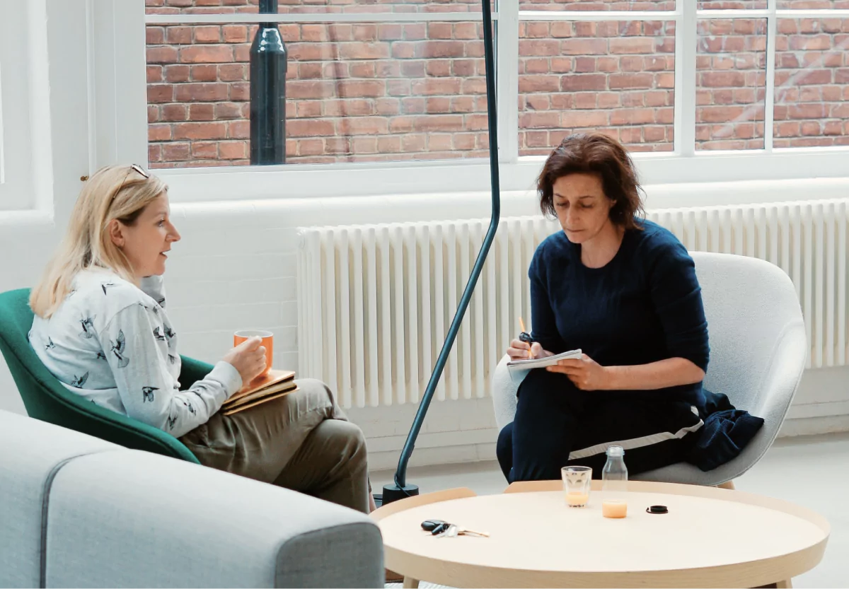 a woman and her doctor talking