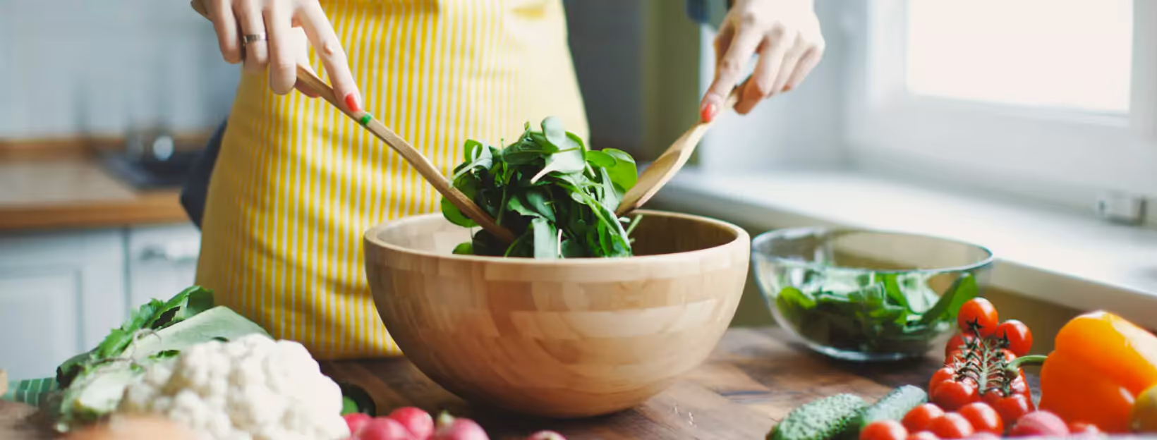 a person making a salad