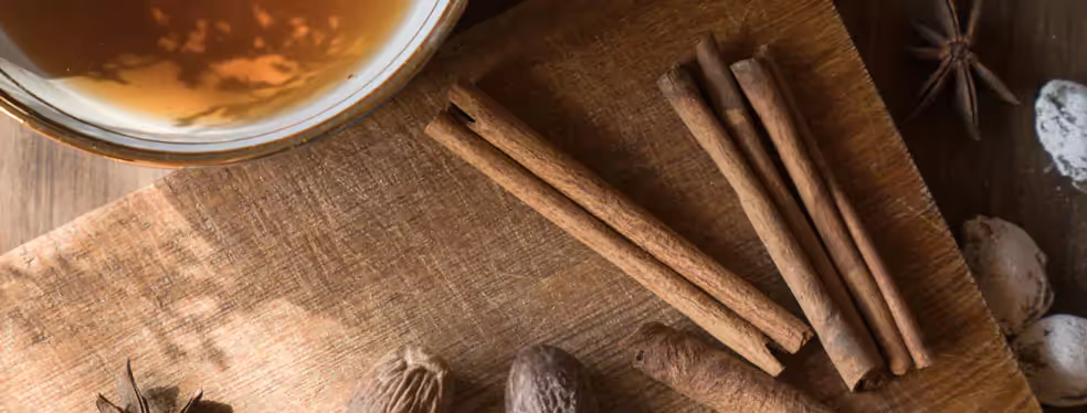 cinnamon sticks on a cutting board