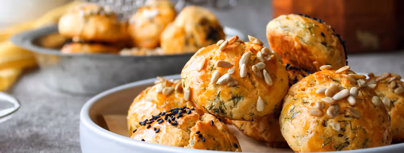 seeded buns on a plate