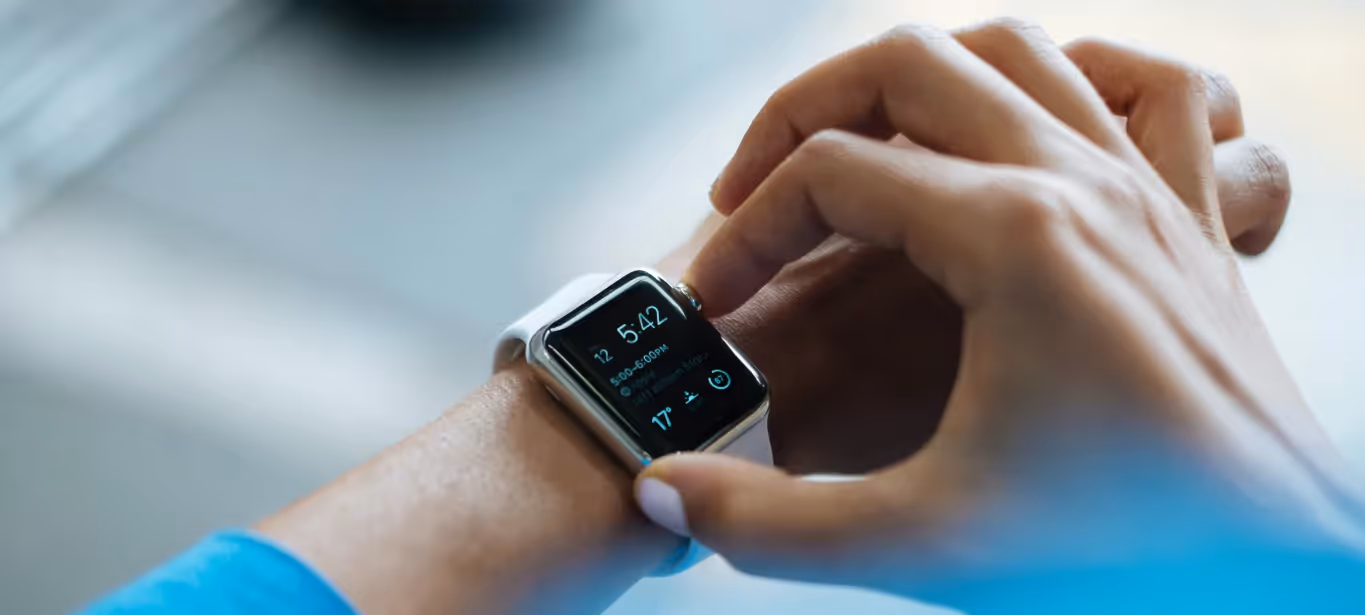 someone wearing a fitness tracker smartwatch