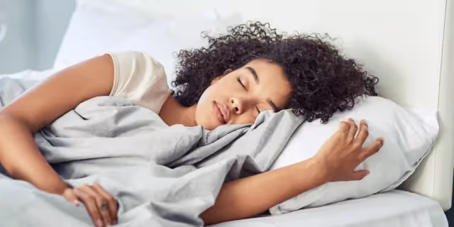 a person sleeping in bed