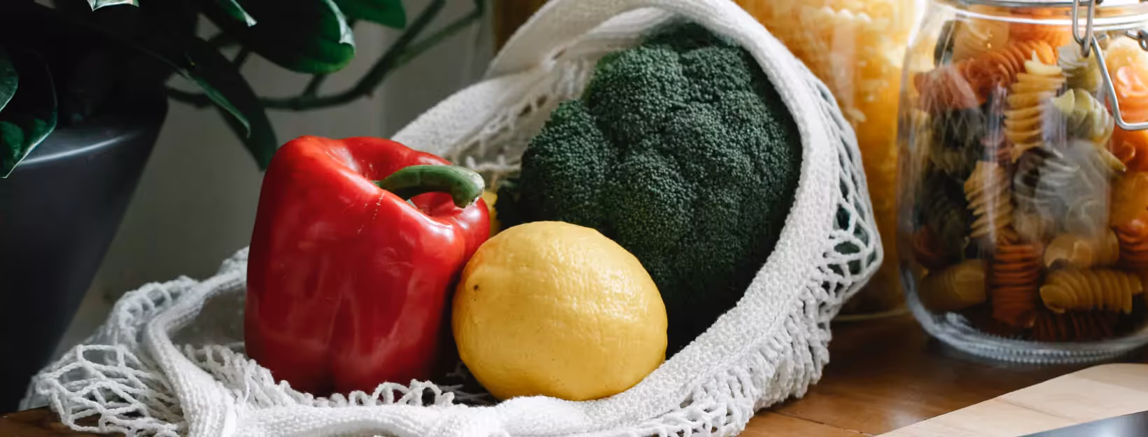 a bag of vegetables and a jar of pasta