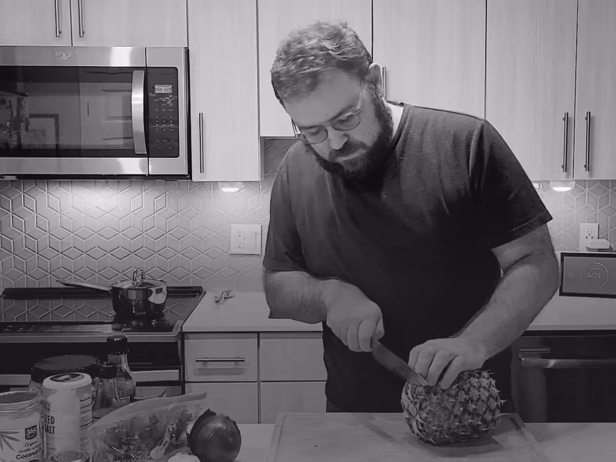 Logan in the kichen, preparing a meal