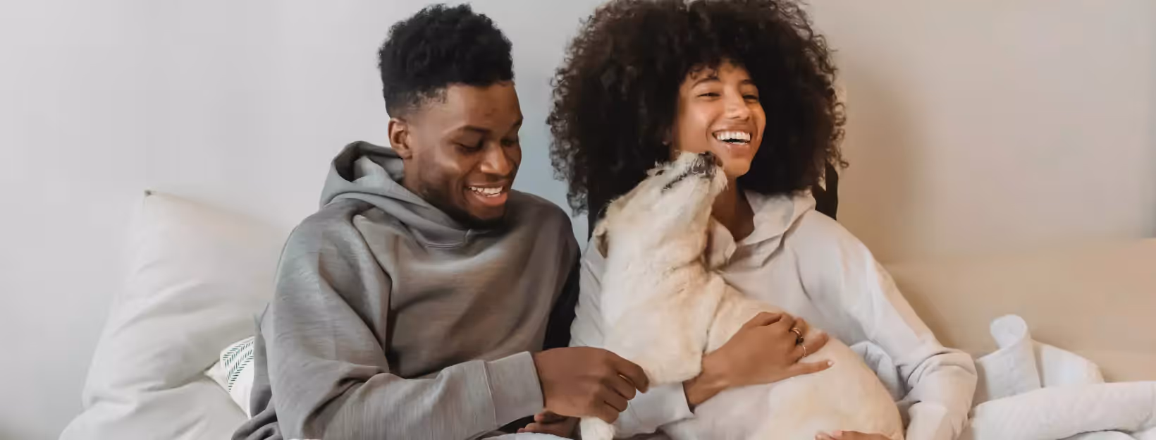 a couple of people and a dog