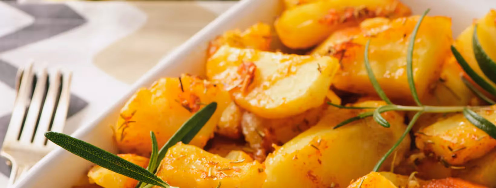 a plate of baked potatoes