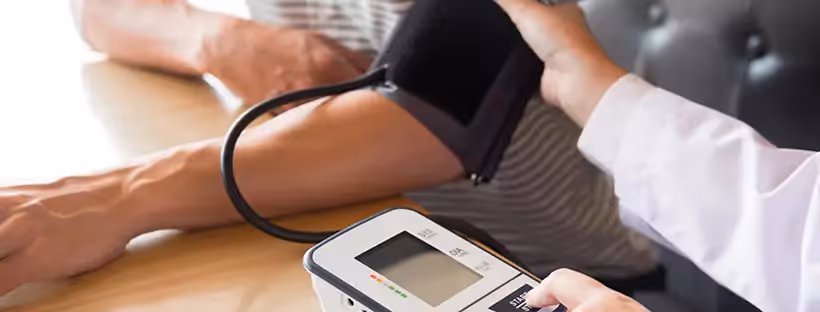 A close-up of someone getting their blood pressure checked