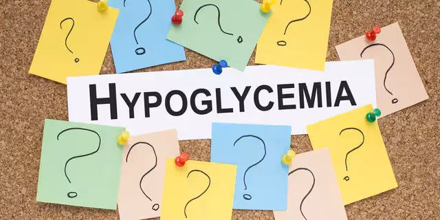 sticky notes with question marks and a note with "Hypoglycaemia" printed on it
