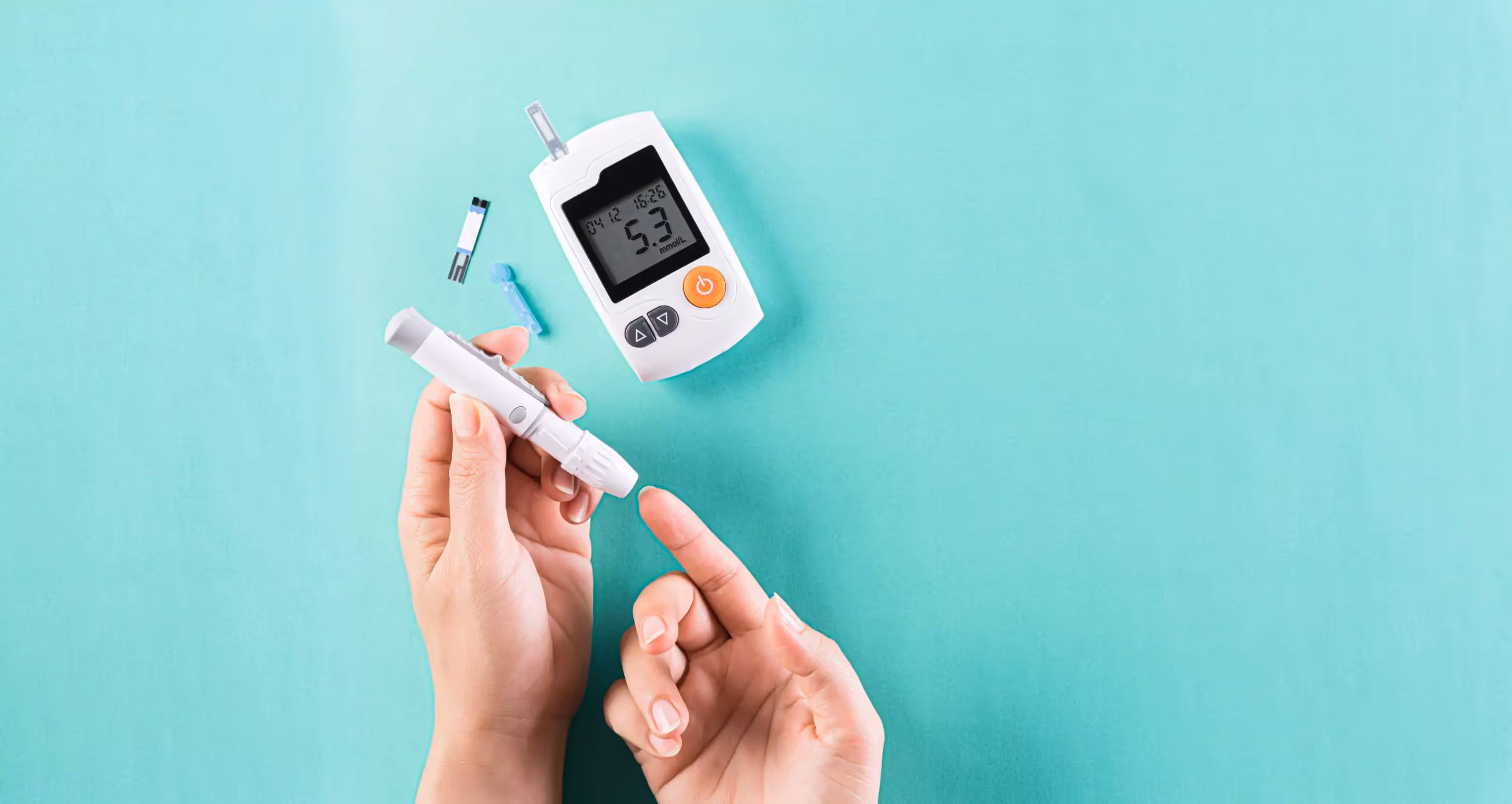 a person using finger prick method to test their glucose level