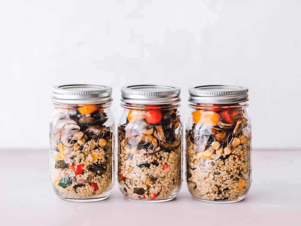 three jars of grains, veggies and mushrooms