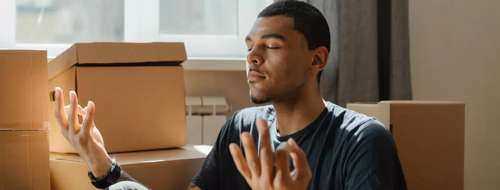a person meditating indoors