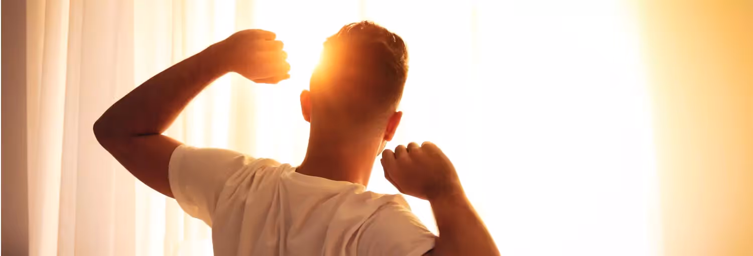 a person waking up in the morning