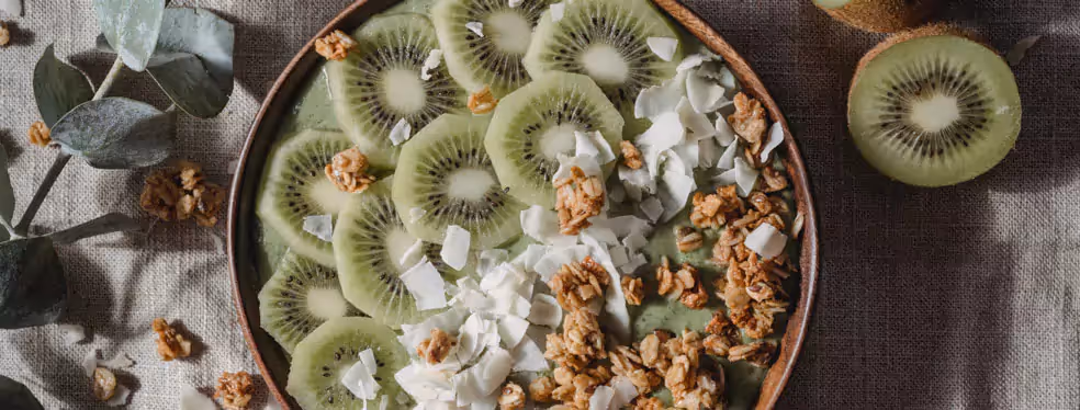 a bowl of kiwifruit smoothie