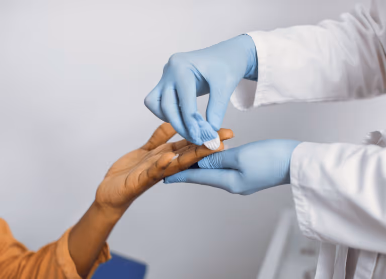 a doctor taking someone's blood
