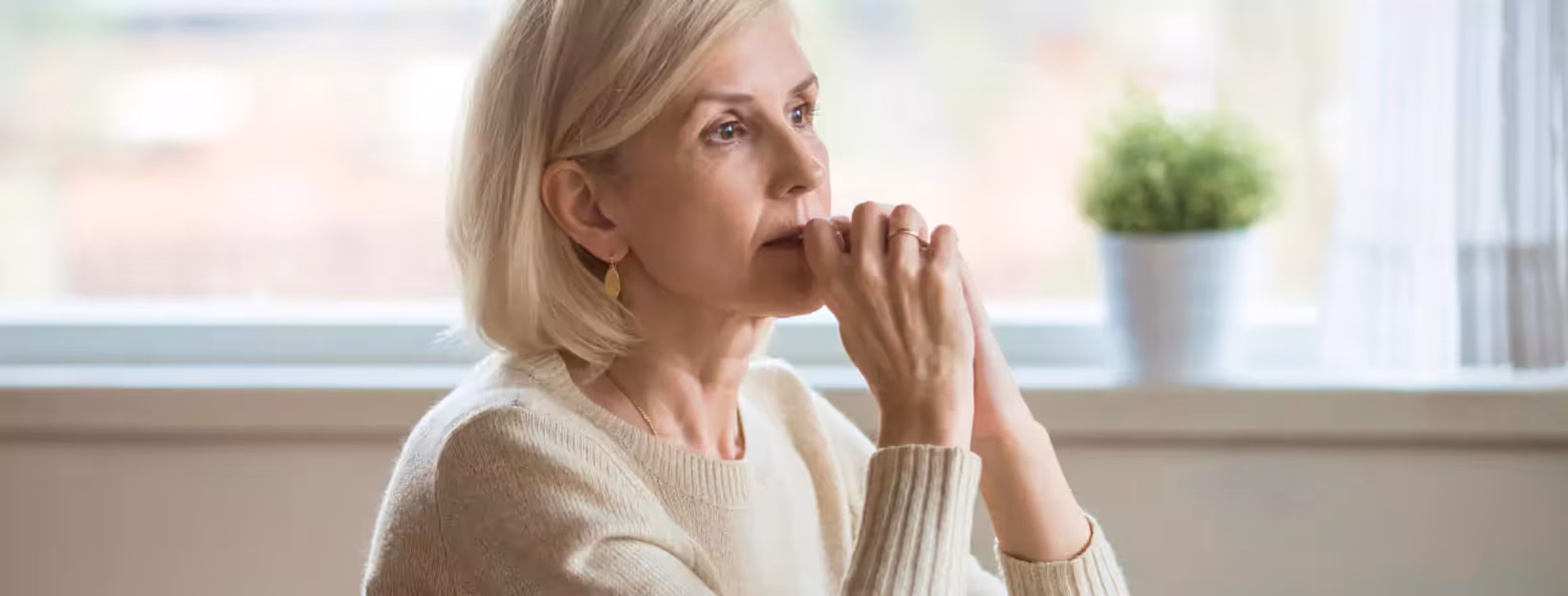 an older woman looking worried