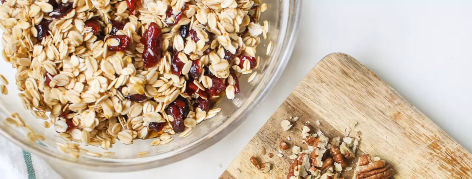 a bowl of rolled oats, raisin and nuts