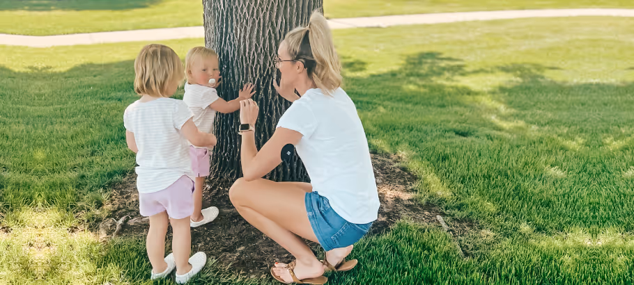 a mother with her two children while wearing a Nutrisense patch