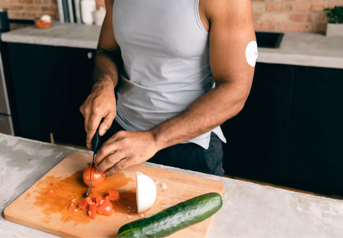 a man chopping veggies