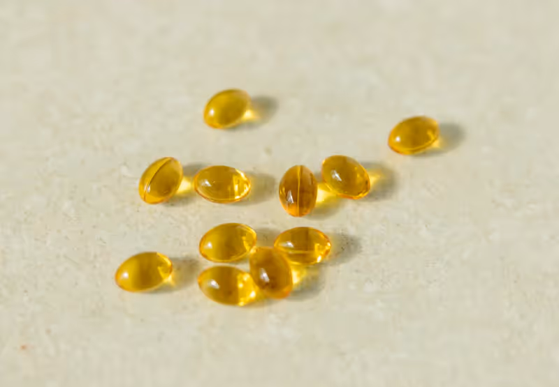 vitamin a pills on a table